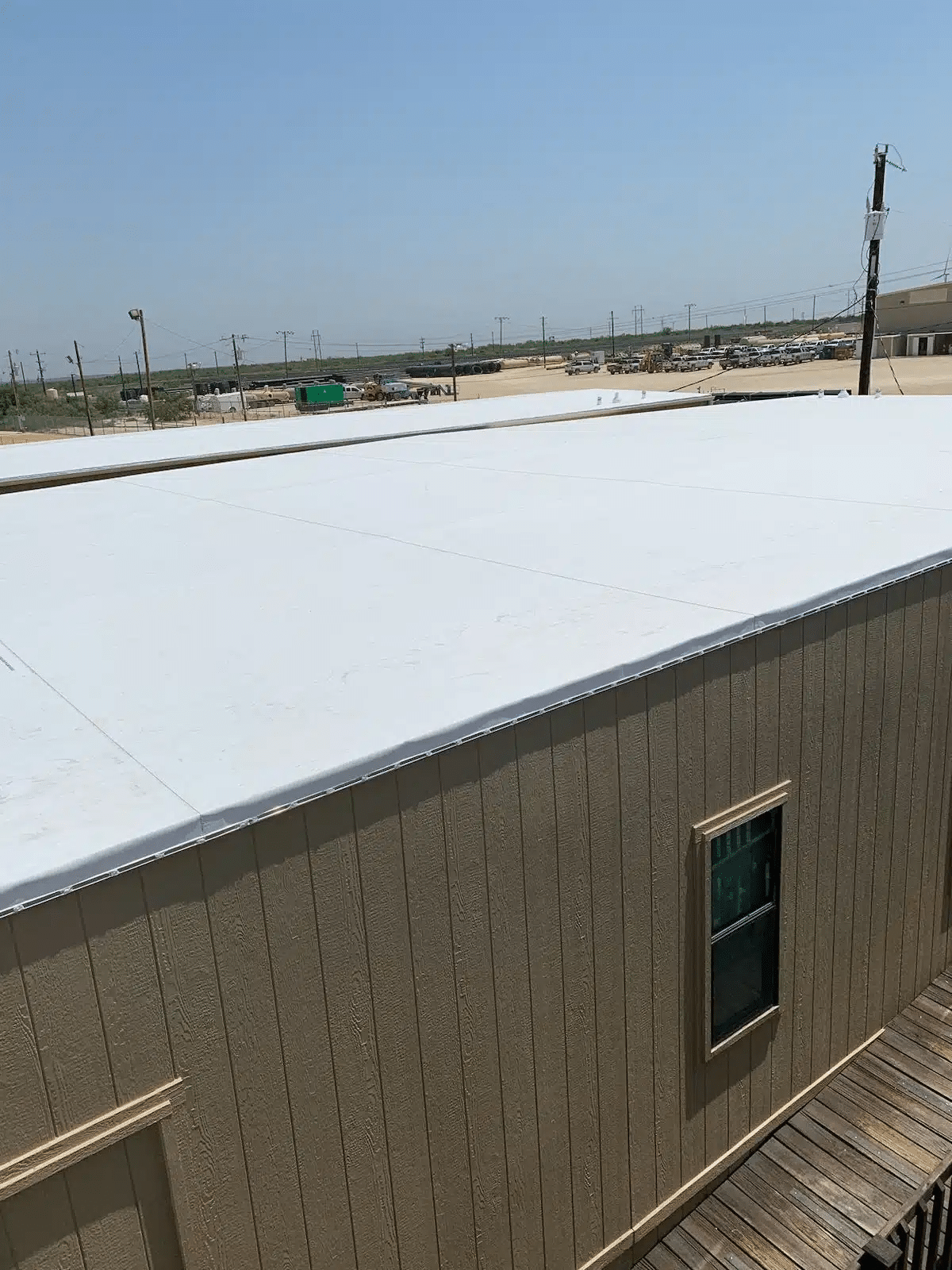 building with a flat roofing system