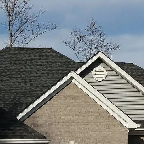 home with a shingle roofing system